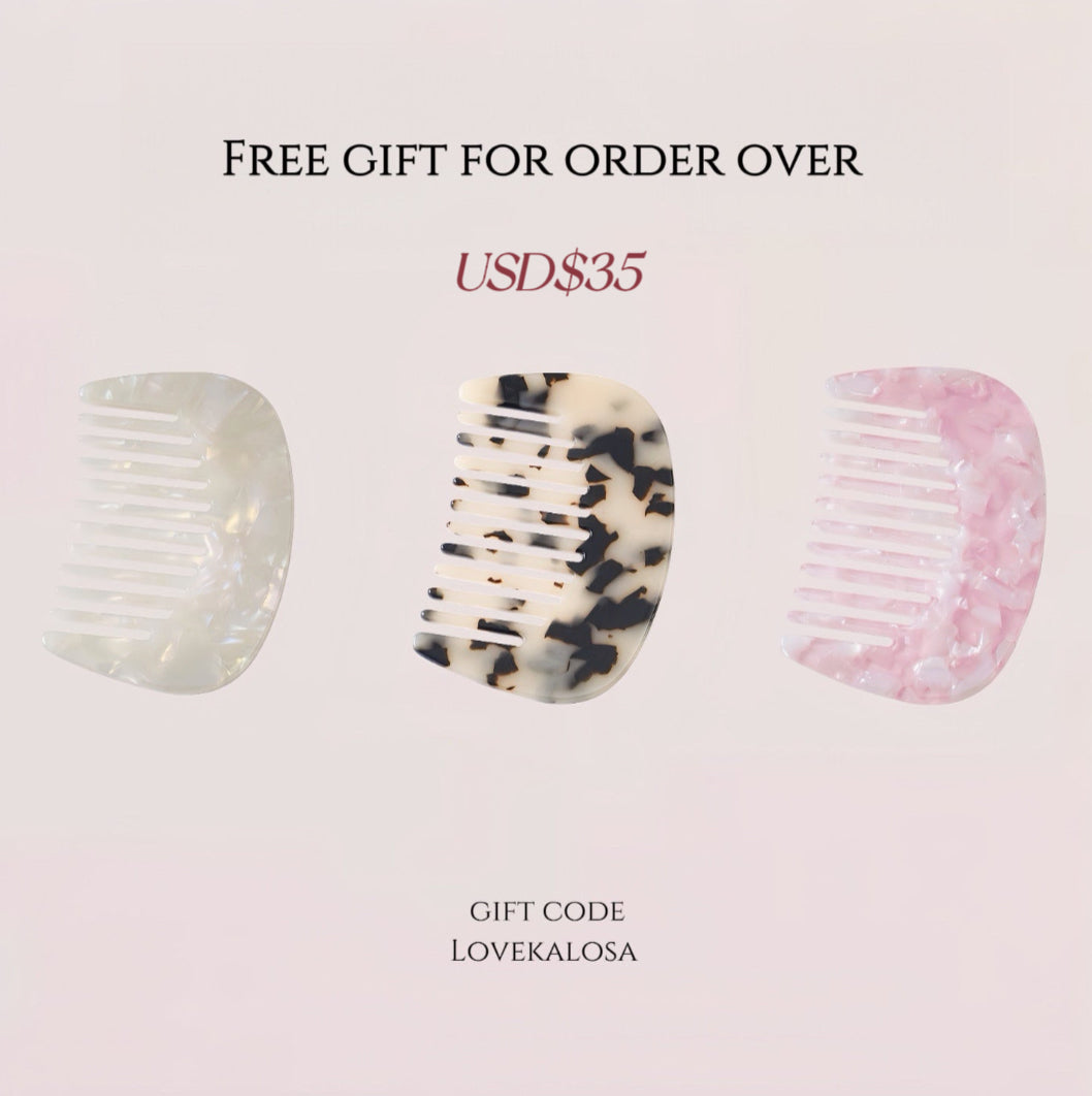 free gift for order over $35 - travel-sized acetate comb
